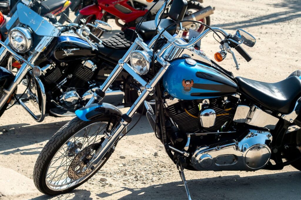 A close-up of stylish parked motorcycles on a sunny day in Wrocław, Poland.